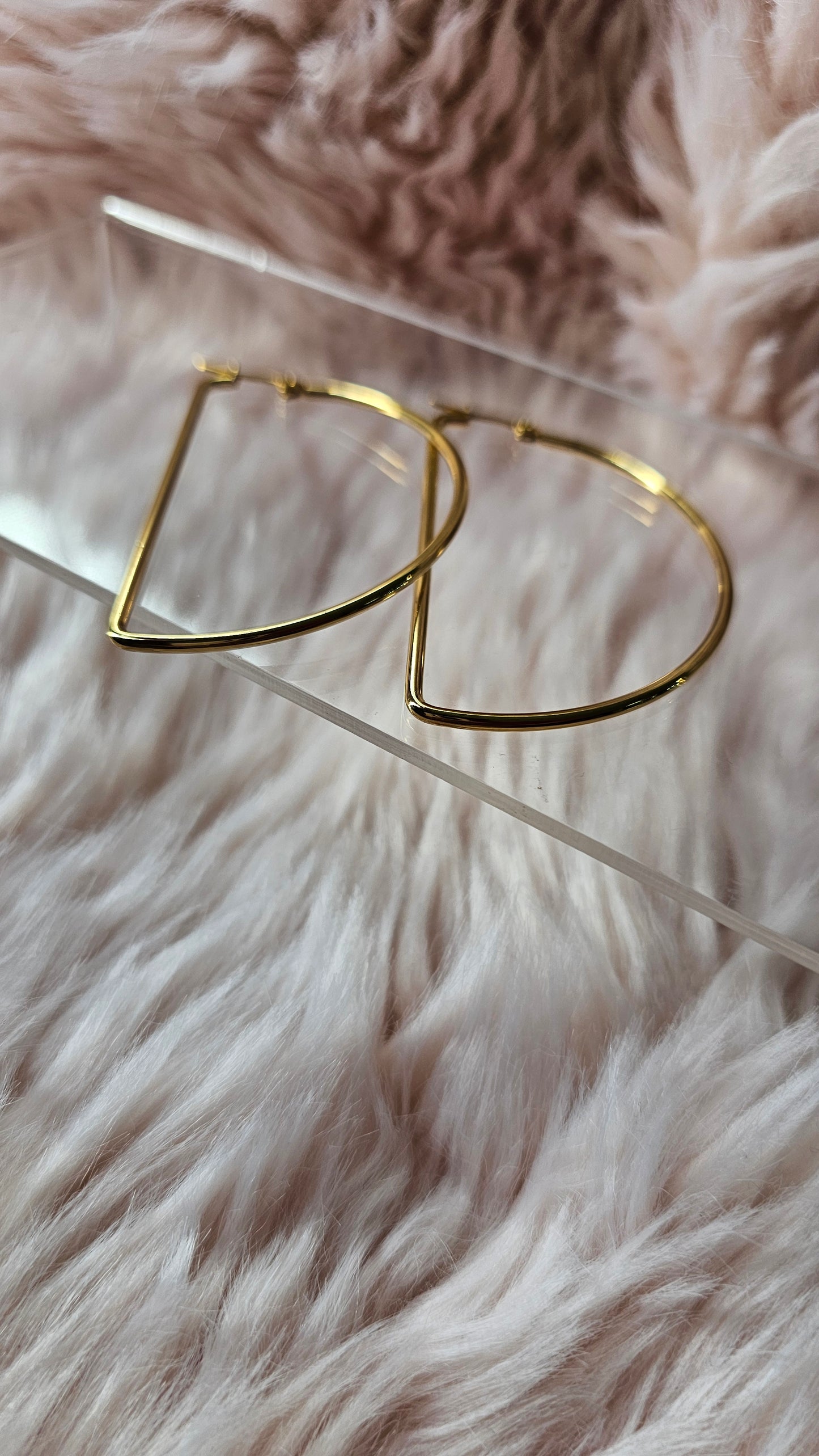 Boucles d’oreilles D