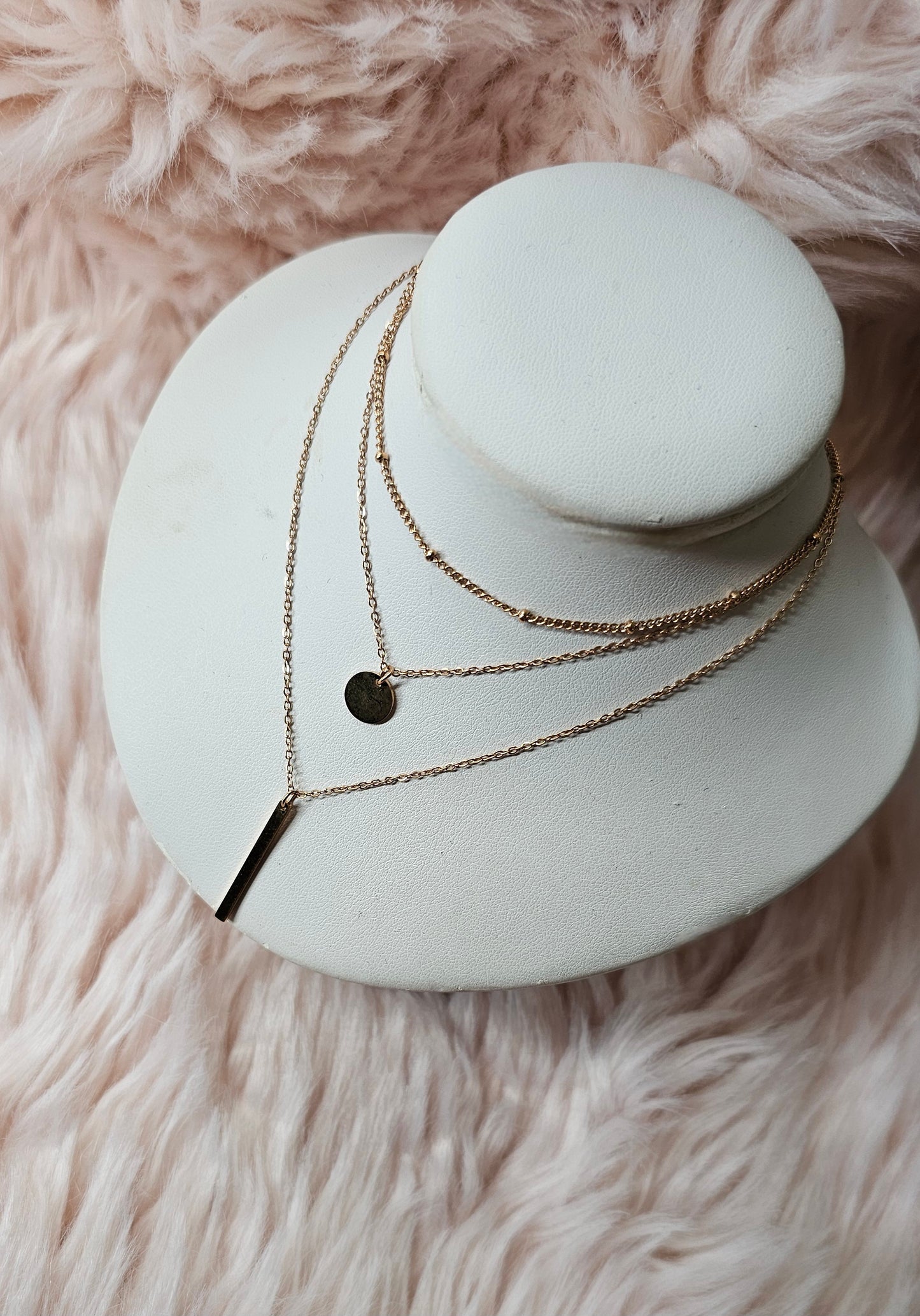 Collier multi-rangs en acier rosé